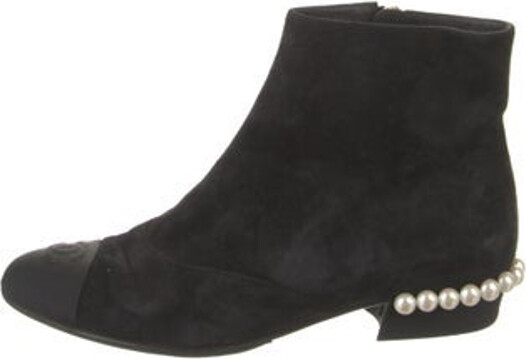 Chanel Suede Ankle Boots From the 2018 Collection by Karl Lagerfeld Black Interlocking CC Logo & Faux Pearl Accents Semi-Pointed Toes Exposed Zip Closure at Sides Includes Dust Bag