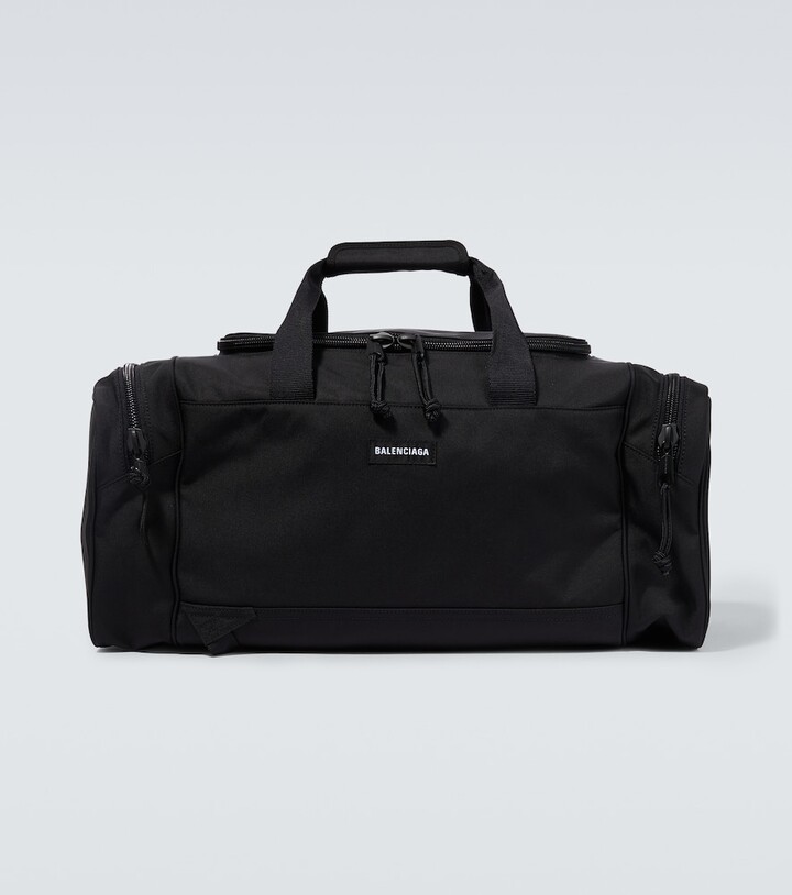 Balenciaga Logo travel bag ShopStyle
