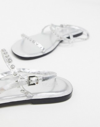 ASOS DESIGN Fuse leather studded flat sandals in silver