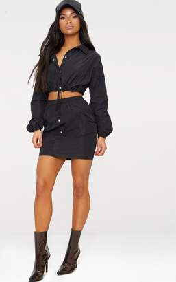 PrettyLittleThing Black Shell Suit Mini Skirt