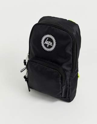 Hype exclusive one shoulder neon strap backpack in black