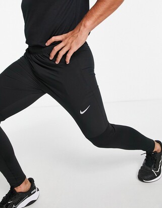 Nike Running UV Challenger Dri-FIT hybrid joggers in black - ShopStyle  Trousers