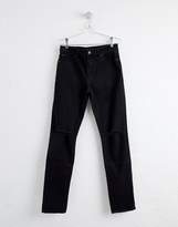 Thumbnail for your product : ASOS Design DESIGN skinny jeans in black with knee rips