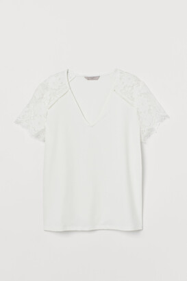 H&M Top with lace sleeves