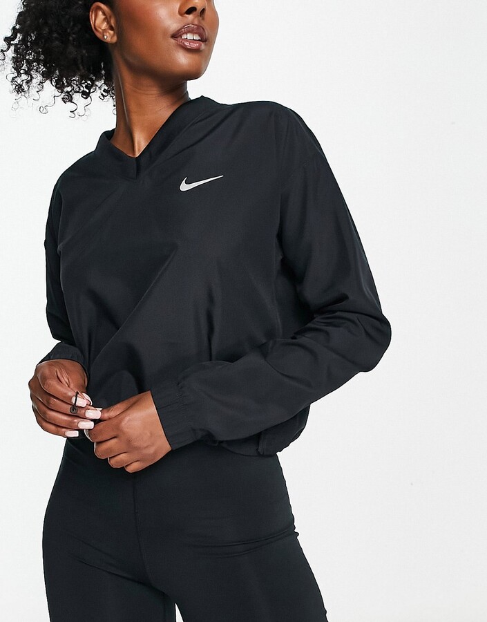 Nike Running Swoosh overhead jacket in black - ShopStyle
