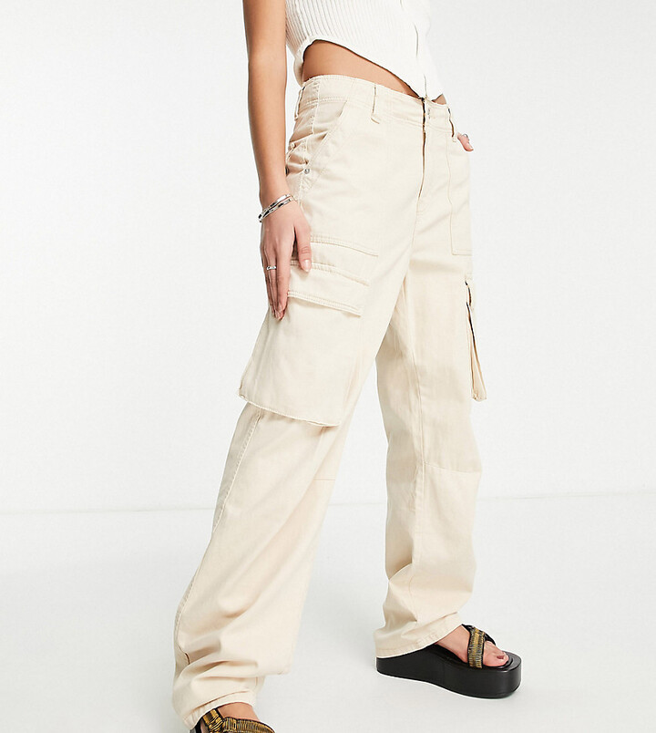 Bershka Petite straight leg cargo trouser in sand ShopStyle