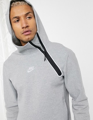 Nike Tech Fleece asymmetric half-zip hoodie in gray - ShopStyle