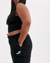 Thumbnail for your product : Puma Plus Essentials trackies in black