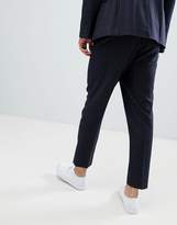 Thumbnail for your product : ASOS ASOS DESIGN tapered suit pants in navy wool blend pinstripe