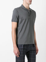 Thumbnail for your product : Prada logo plaque polo shirt - men - Cotton - S