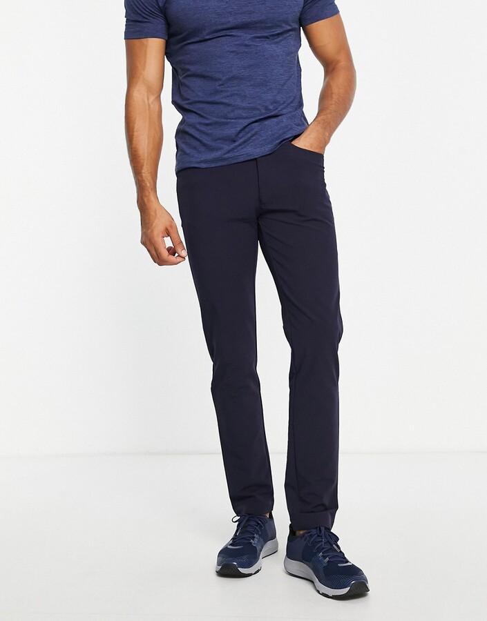 Calvin Klein Golf Genius slim fit trousers in navy - ShopStyle