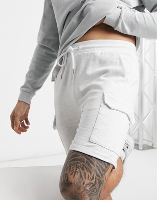 ASOS DESIGN jersey shorts with cargo pockets in white heather - ShopStyle