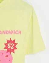 Thumbnail for your product : Reclaimed Vintage inspired relaxed t-shirt with retro ice cream print in yellow pique