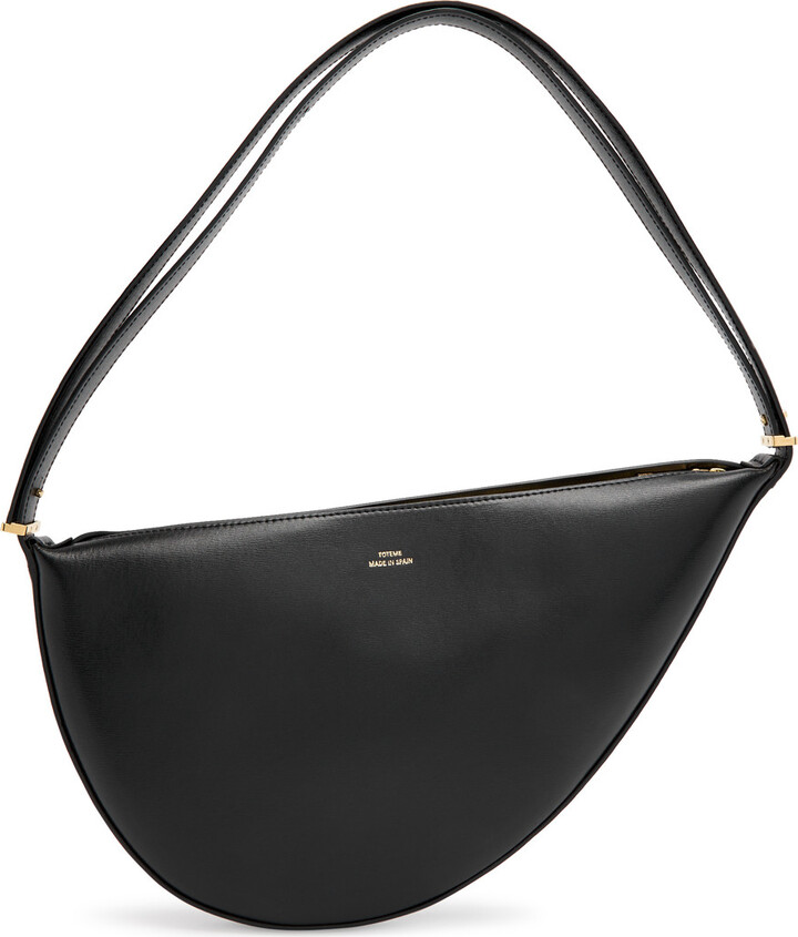 Totême Scooped Sling Leather Cross-body bag