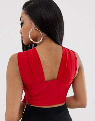 PrettyLittleThing Petite Petite slinky wrap crop top with ring detail in red