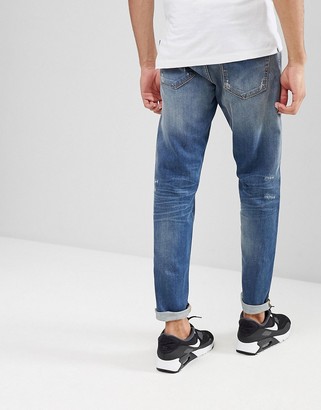 Selected Jeans In Tapered Fit With Rip Repair Italian Denim-Blue
