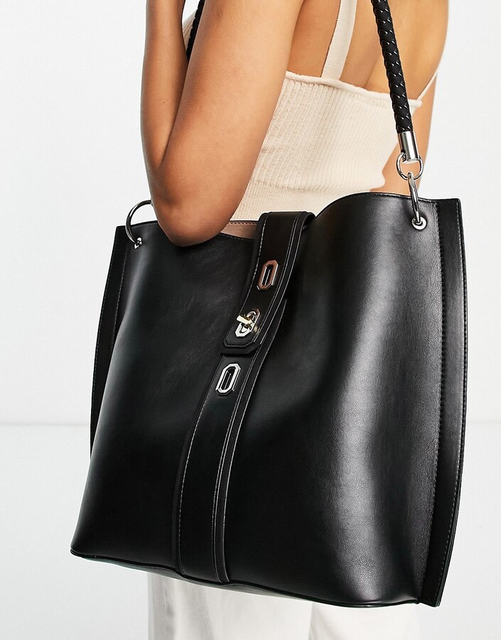 large tote bag with turn lock in black ShopStyle