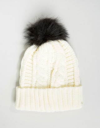 7X Knitted Beanie Hat With Faux Fur Pom Pom