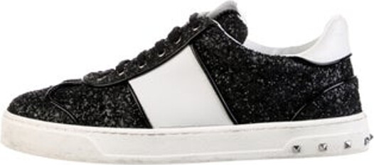 Valentino Glitter Low Top Sneakers Black Colorblock Pattern Rockstud Accents Rubber Trim Round-Toes with Glitter Accents Lace-Up Closure at Uppers