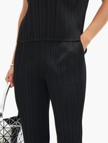Thumbnail for your product : Pleats Please Issey Miyake High-rise Technical-pleated Tapered Trousers - Black