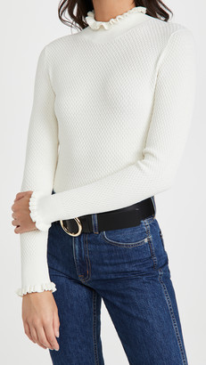 cream colored mock turtleneck