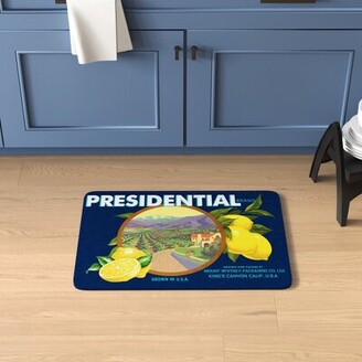https://img.shopstyle-cdn.com/sim/5e/50/5e50af64359aa639cabc108ce4a08bb6_xlarge/rapp-presidential-lemons-kitchen-mat.jpg