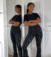 Thumbnail for your product : Topshop Petite flare trousers in ditsy floral print