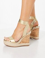 Thumbnail for your product : ASOS DESIGN Wide Fit Tiffany elastic cork wedges in gold