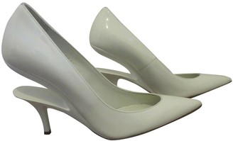 white patent leather heels