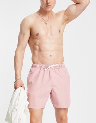 ASOS DESIGN swim shorts in pink mid length