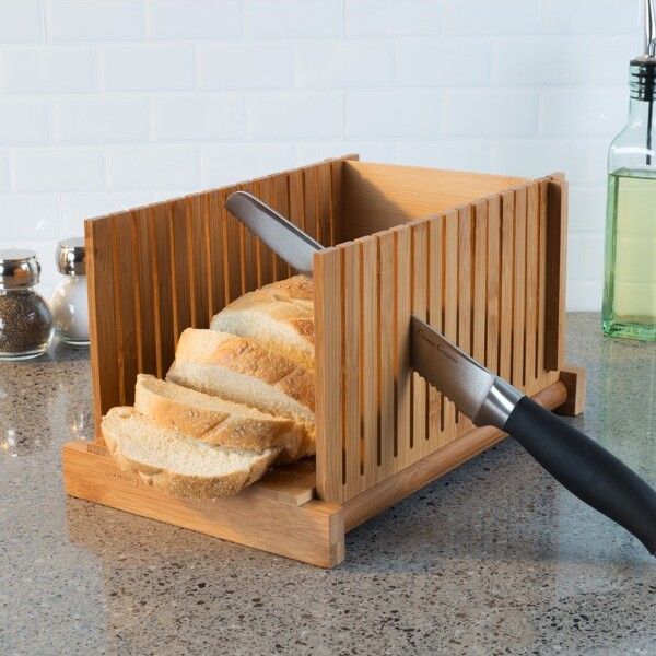 https://img.shopstyle-cdn.com/sim/5e/e7/5ee72ded35a76101572e084d48f9474e_best/bamboo-bread-slicer-foldable-adjustable-knife-guide-and-board-for-even-loaf-cutting-food-preparation-tool-for-home-bakers-by-classic-cuisine.jpg