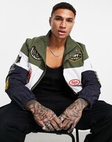 Thumbnail for your product : GUESS Paul color block jacket with all over badge logos in green/navy