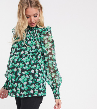 Asos DESIGN Maternity high neck with shirred detail in blurred floral print Asos DESIGN Maternity high neck with shirred detail in blurred floral print