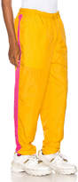 Thumbnail for your product : Comme des Garcons SHIRT Mesh Pants in Yellow & Pink | FWRD