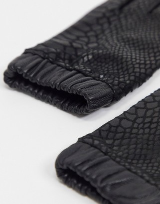 ASOS DESIGN leather gloves in shiny snake print with ruched cuff in black