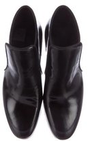 Thumbnail for your product : Celine Patent Leather Round-Toe Booties