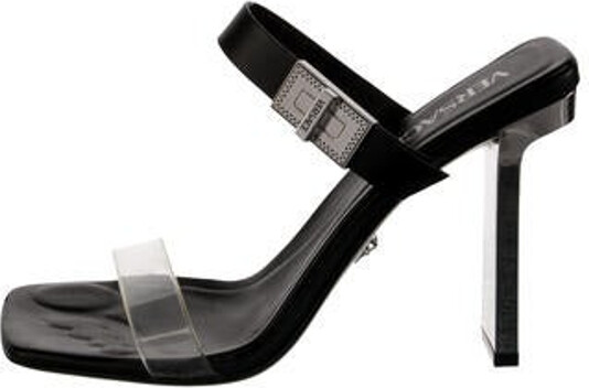 Versace Leather Slides Black & Clear Includes Box & Dust Bag Unfortunately, due to restrictions, this item may not be eligible for shipping in all areas.