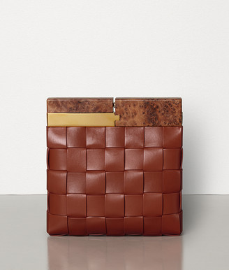 rust coloured clutch bag