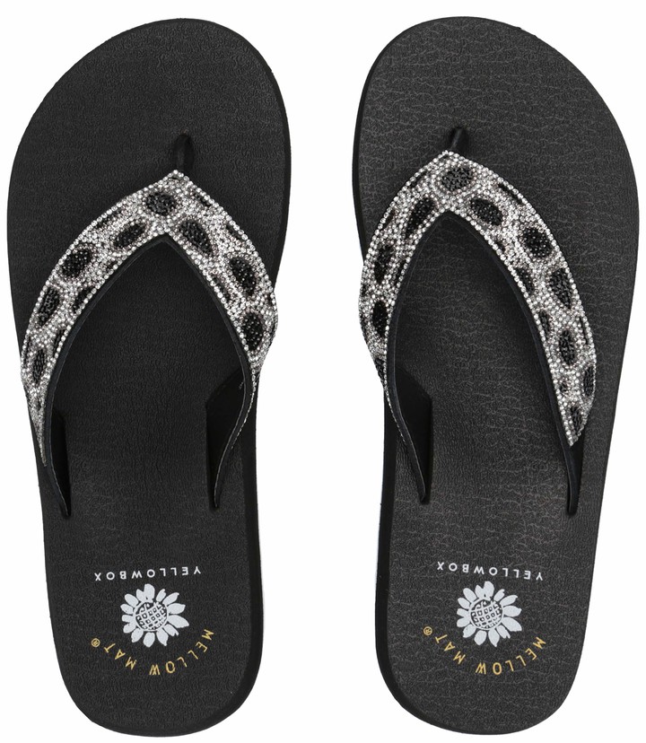 yellow box gray flip flops
