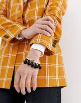 Thumbnail for your product : ASOS DESIGN Tassel Cuff Bracelet