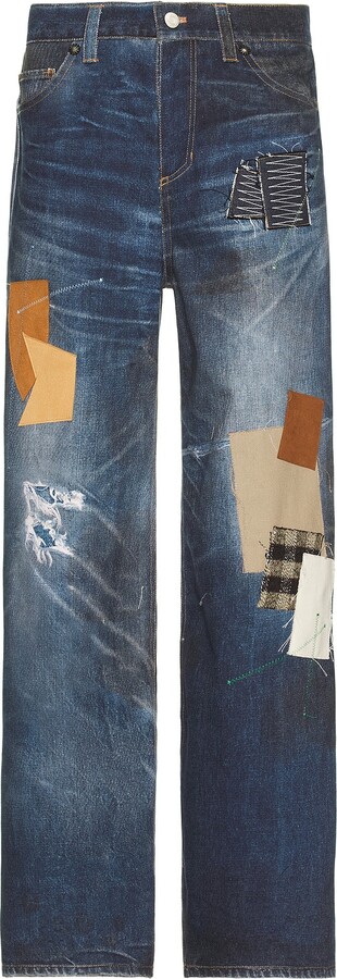 ANDERSSON BELL Unisex Patchwork Printed Denim Trompe L`Oeil Jeans in Blue