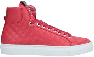 red and pink trainers