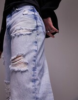 Thumbnail for your product : Topman loose ripped jeans in light wash