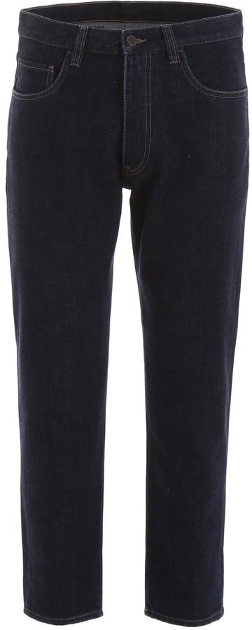 jeans with triangle logo on back pocket