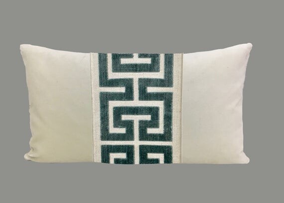 https://img.shopstyle-cdn.com/sim/60/df/60df4681d4c4ca190f63e2250f60bb87_best/off-white-velvet-lumbar-pillow-cover-with-large-mist-greek-key-trim.jpg