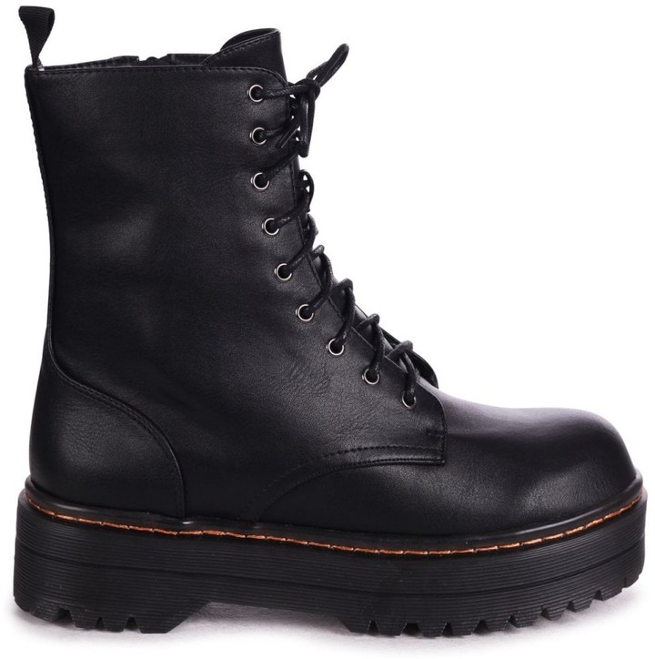 black patient patent military lace up boots with chunky sole