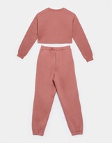 Thumbnail for your product : ASOS DESIGN DESIGN tracksuit cropped sweat / oversized jogger in dusty rose