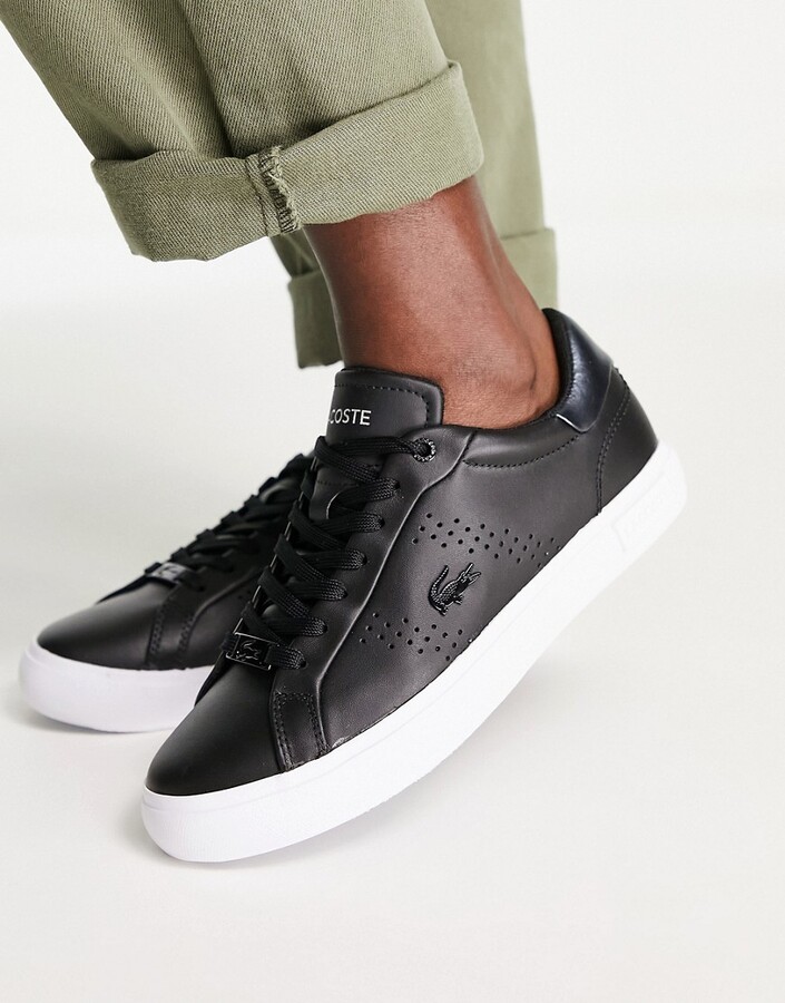 black trainers lacoste
