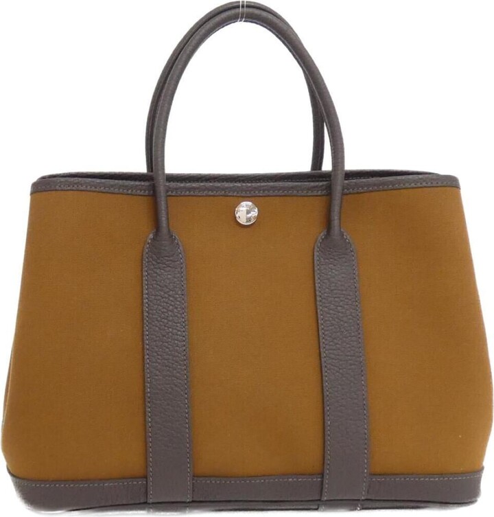 Hermes Alezan Ebene Toile Officier Negonda Leather Handbag (Pre-Owned)