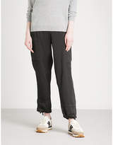 Thumbnail for your product : Brunello Cucinelli Belted high-rise tapered satin trousers